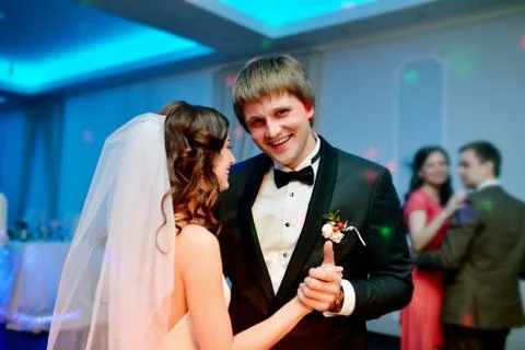 Wedding couple in the restaurant is dancing Stock Photos
