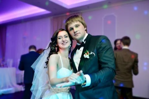 Wedding couple in the restaurant is dancing Stock Photos
