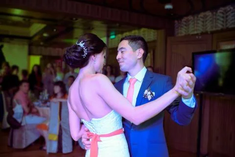 Wedding couple in the restaurant is dancing Stock Photos