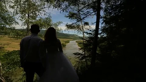 Wedding couple on a rock 스톡 동영상 82816515