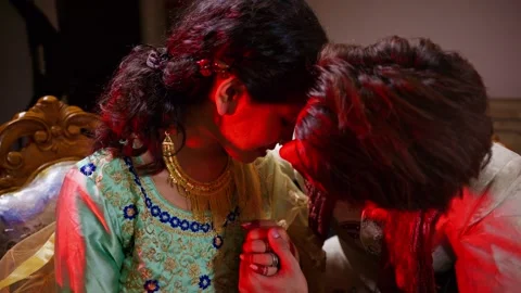 Wedding couple sits closely sharing an intimate moment Stock-Footage 300351633