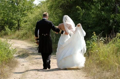 Wedding couple walking Stock Photos