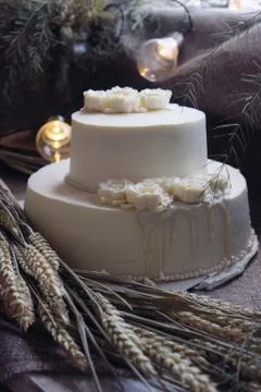 Wedding cream cake on rustic background. Beautiful Gourmet tart decorated with Stock Photos