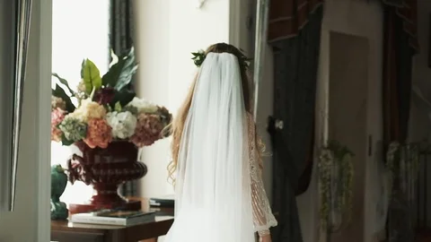 Wedding Day. Bride Comes Out Of The Room. Girl With Long Hair And Wreath On Her Stock-Footage 110744491
