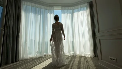 Wedding Day. Bride Looks At The Window. Video stock 109507249