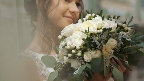 Wedding Day. Bride Sniffs The Flowers. Stock Footage 111799372