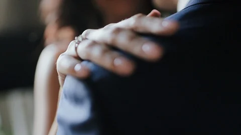 Wedding Day. Bride Is Stroking The Groom's Shoulder. Video stock 107937997