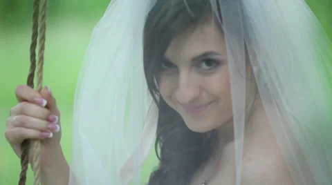 Wedding day. Bride on a swing. Stock Footage 32475858