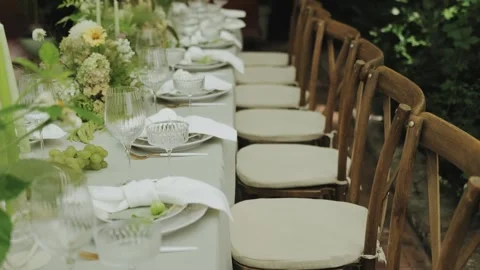 Wedding decor, banquet decor. Elegant outdoor dining area with beautiful fresh Stock Footage 306152108