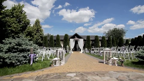 Wedding decor chairs arch slide left Stock Footage 71948291