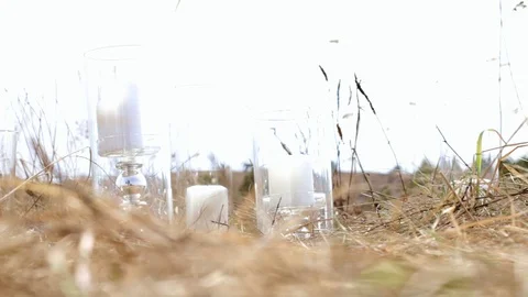 Wedding decor. Field. Park. Design of event. Beautiful candle Stock Footage 93539672