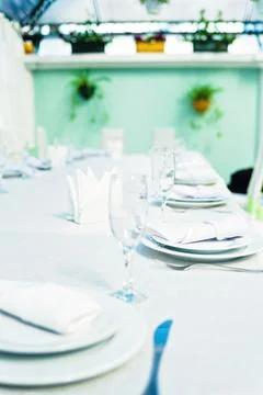 Wedding decor in a restaurant on the table Stock Photos