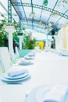 Wedding decor in a restaurant on the table Stock Photos