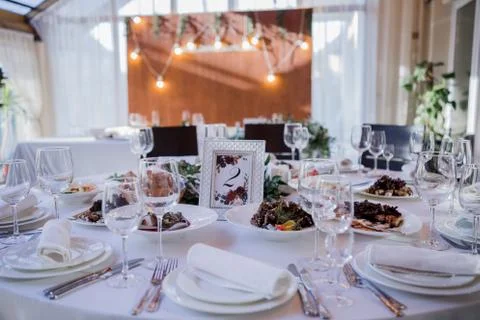 Wedding decor on a table in a restaurant Stock Photos