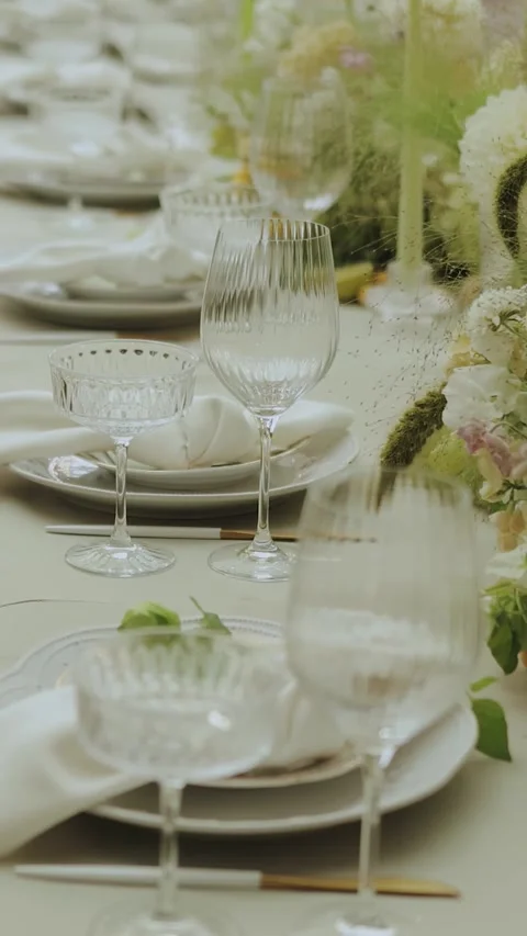 Wedding decor. Table Setting for a Special Event with Beautiful Floral Stock Footage 306529983