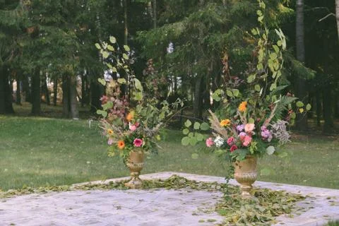 Wedding decor two big vases stand on the ground Stock Photos