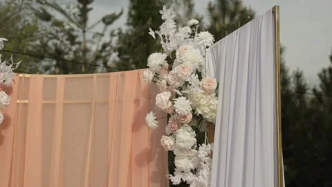Wedding decor from white and orange fabric Stock Footage 314133608