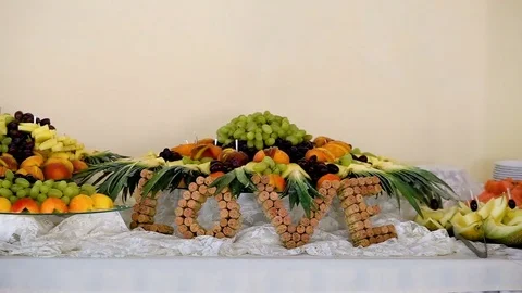 Wedding decorated candy buffet with corks word LOVE Stock Footage 83276097