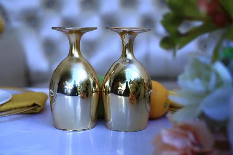 The wedding decorated glittering glasses on the table Stock Photos