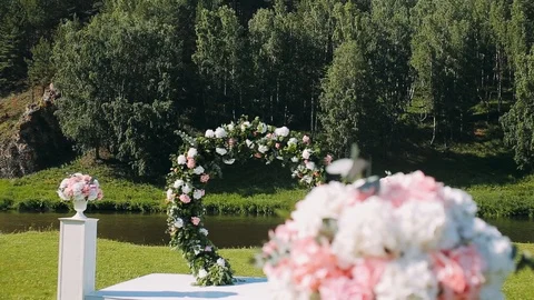 Wedding decoration, wedding reception set outdoors under bright sun on resort Video stock 95860179