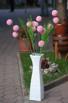 Wedding decorations with bench, flowers composition on ceremony place Photos