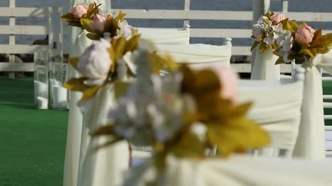Wedding decorations on the chairs Stock Footage 107515750