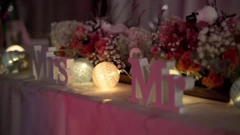 Wedding decorations Mr and Mrs on the wedding table  in night light Stock-Footage 239734733