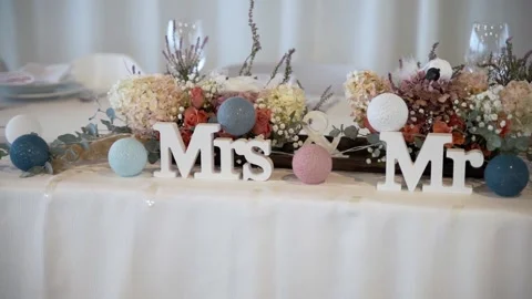 Wedding decorations Mr and Mrs on the wedding table Stock Footage 239735079