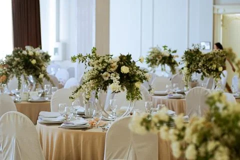 Wedding decorations. Served wedding table with decorative fresh bright flow.. Stock Photos