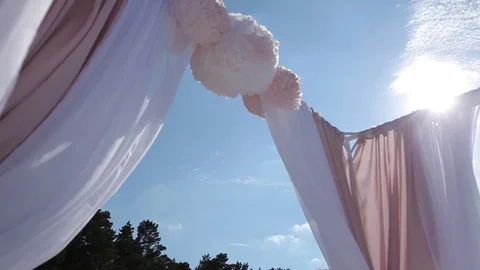 Wedding decorations from white and red flowers ceremony floristics near the sea Video stock 93722427