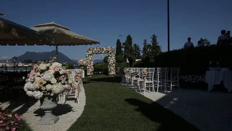 Wedding decorations from white and red flowers ceremony floristics Video stock 93723418