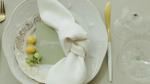 Wedding decor.Beautifully arranged table setting showcasing a decorative napkin Stock Footage 306149722