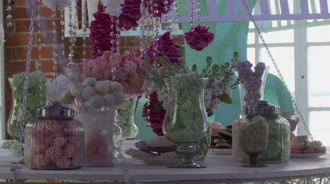 Wedding dessert table decorated with flowers Video stock 43965150