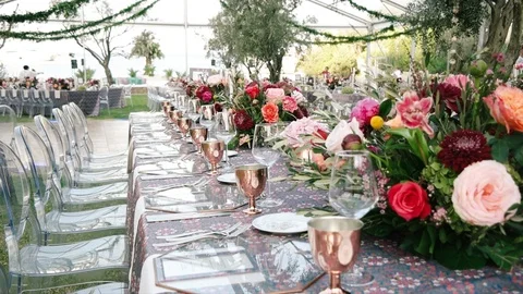 Wedding dining table. Rustic wedding. Rouquet of roses. Colorful flowers. Stock Footage 125191968
