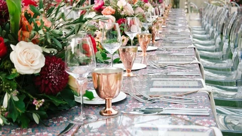 Wedding dining table. Rustic wedding. Rouquet of roses. Colorful flowers. Stock Footage 125270113