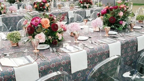 Wedding dining table. Rustic wedding. Rouquet of roses. Colorful flowers. Stock Footage 125270588