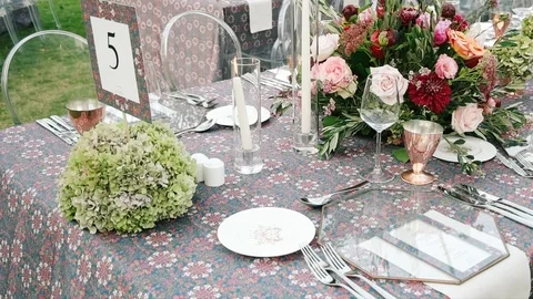 Wedding dining table. Rustic wedding. Rouquet of roses. Colorful flowers. Stock Footage 125275052