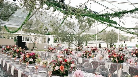 Wedding dining table. Rustic wedding. Rouquet of roses. Colorful flowers. Stock Footage 125276791