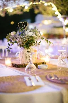 Wedding dining table. Table number nine. Rustic wedding. Stock Photos
