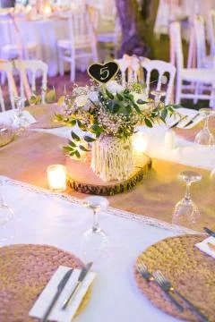 Wedding dining table. Table number nine. Rustic wedding. Stock Photos