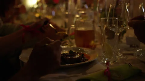 Wedding Dinner Table Eating Candlelit Meal - 4k Video stock 52529049