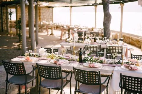 Wedding dinner table reception. There are many rectangular tables for guests Foto stock