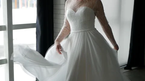 Wedding dress is developing slowly Stock Footage 101308178