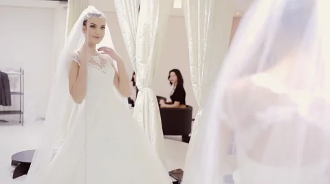 Wedding Dress Fitting in Bridal store Stock Footage 59337640