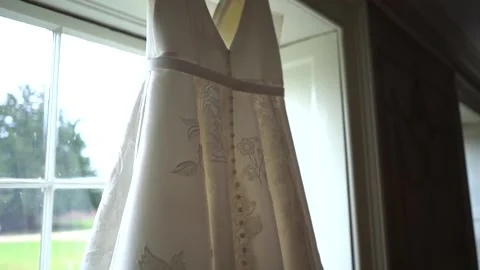 Wedding dress in window 3 Stock Footage 170932295