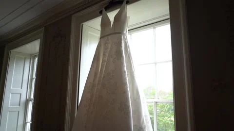 Wedding dress in window 4 Stock Footage 170932938