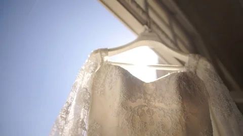 Wedding Dress in the Window Stock Footage 75165182