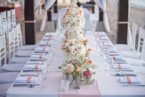 Wedding The elegant dinner table on the beach Stock Photos