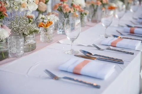 Wedding The elegant dinner table on the beach Stock Photos