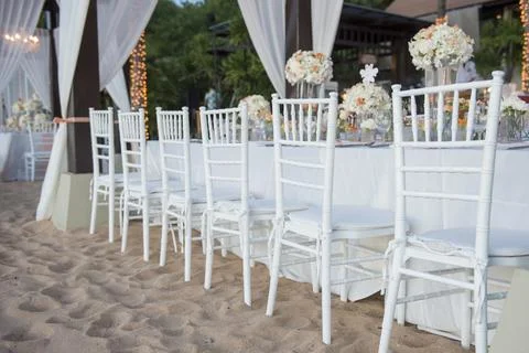 Wedding The elegant dinner table on the beach Stock Photos